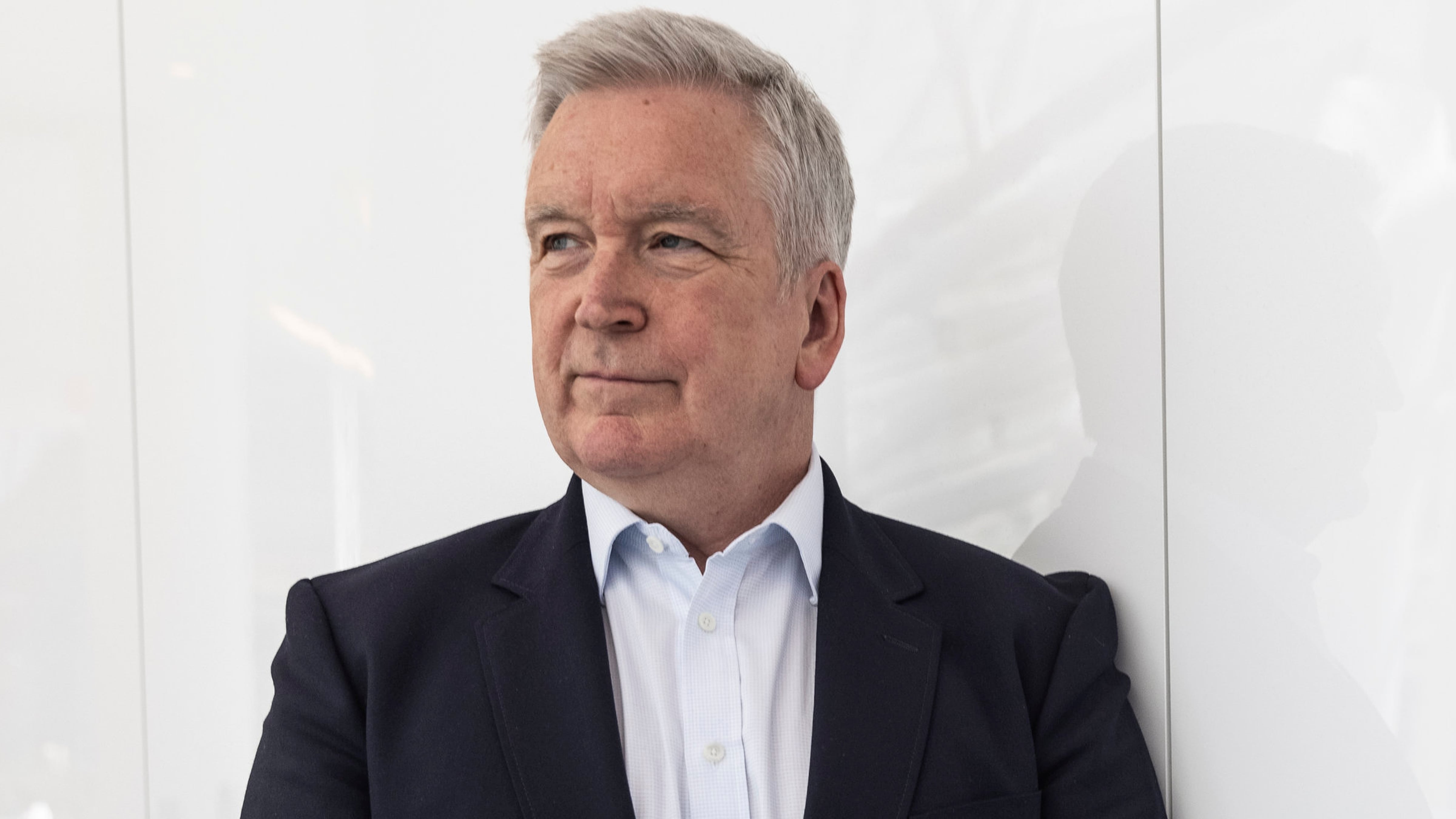 Head and shoulders image of Aston Martin CEO Adrian Hallmark