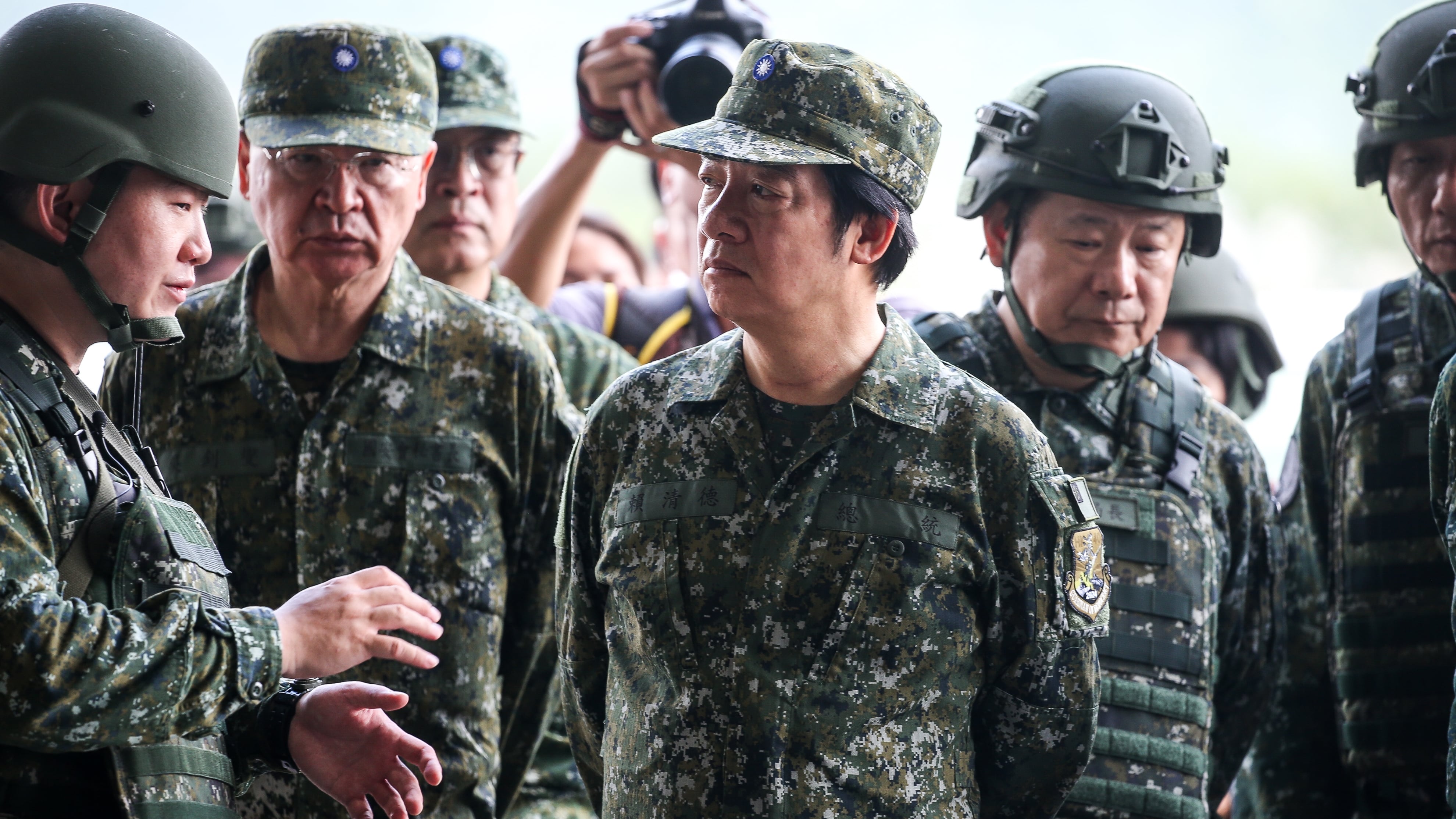 In the shadow of China’s military, Taiwan’s globally critical suppliers keep working