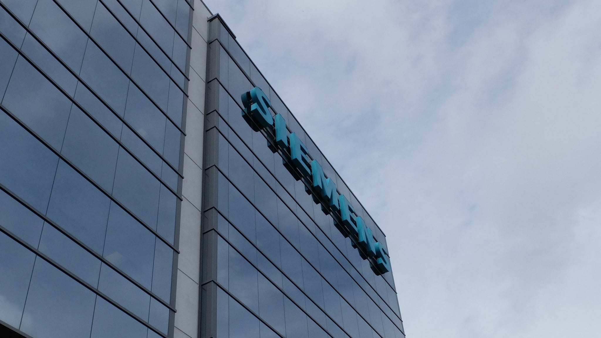 Photo of the exterior of a Siemens building.