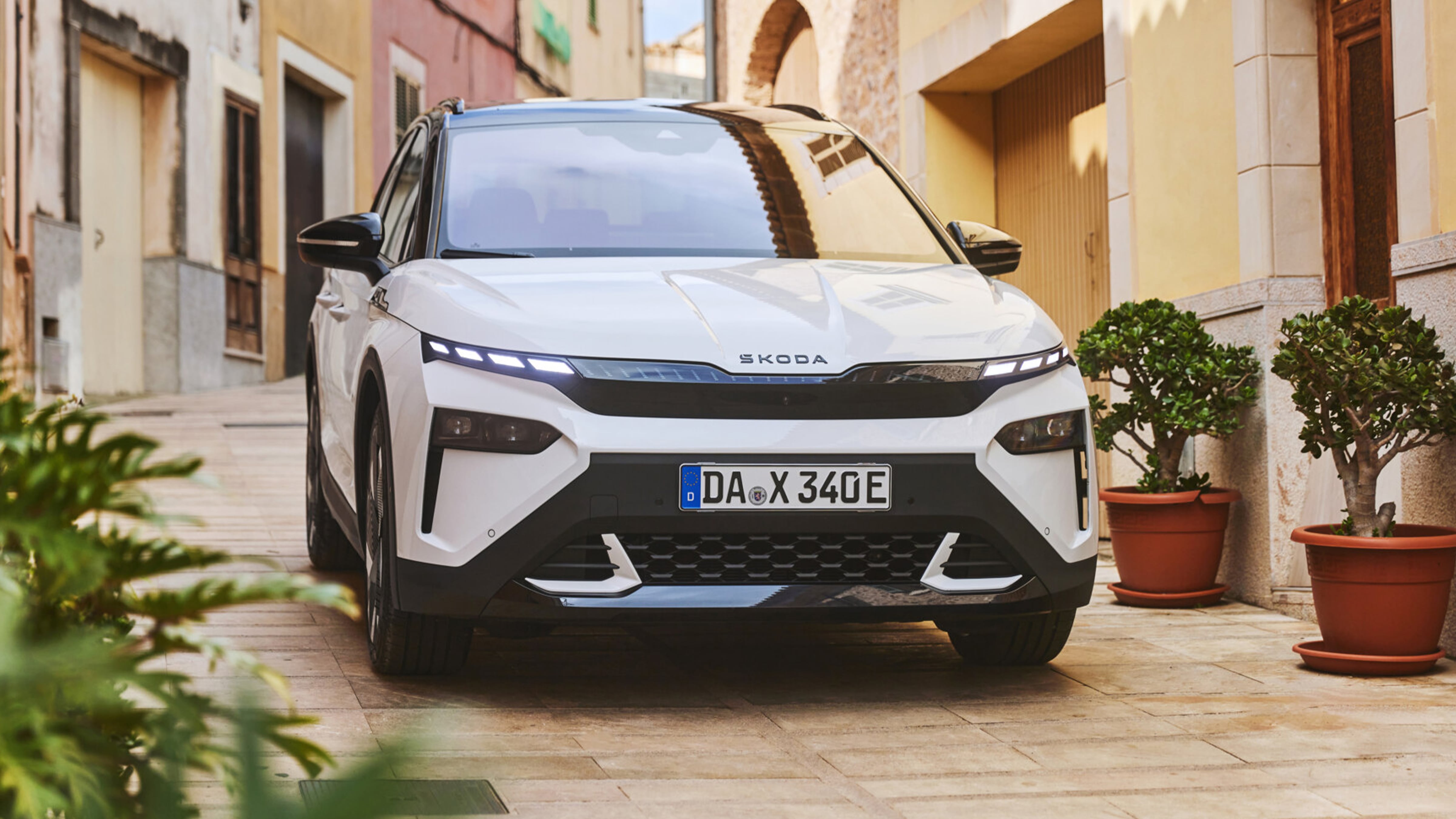 Front view of a white Skoda Elroq electric compact SUV