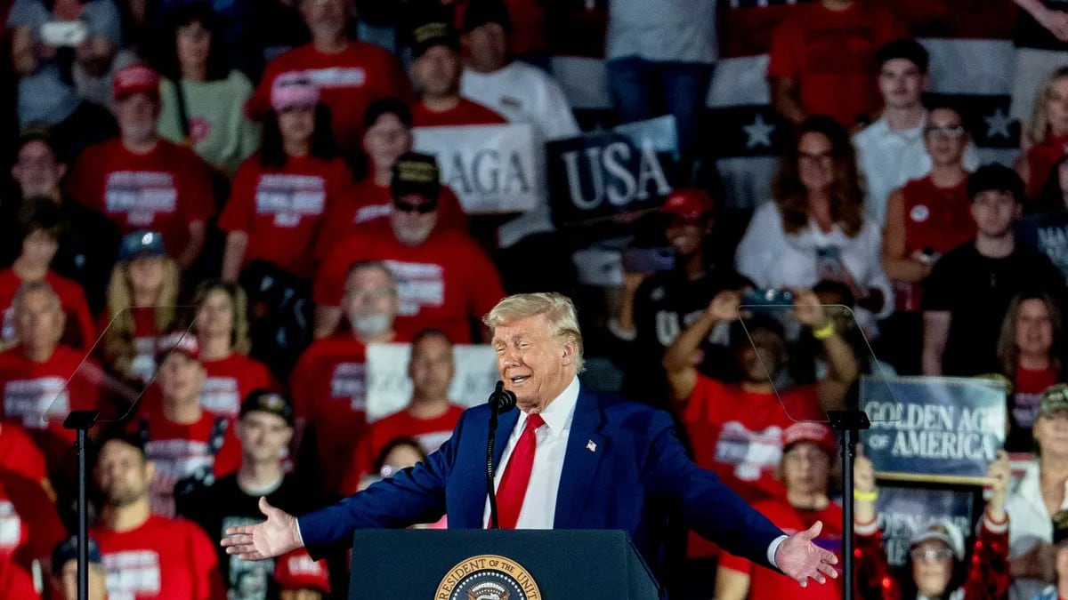 President Donald Trump speaks in front of a crowd at an April 29 rally in suburban Detroit.